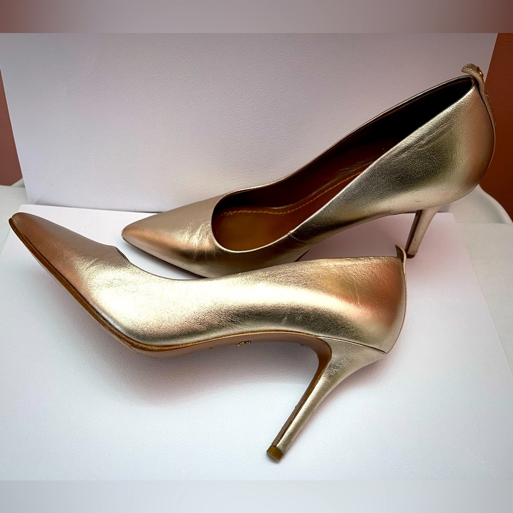 Coach gold pumps